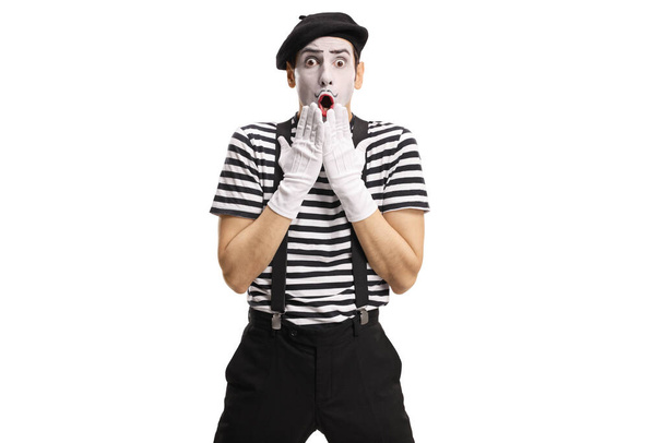 Surprised pantomime man gesturing with hands isolated on white background - Zdjęcie, obraz