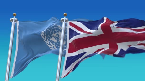 4k nahtlose vereinte nationen und vereinigtes königreich britisch england flaggen mit blauen s - Filmmaterial, Video