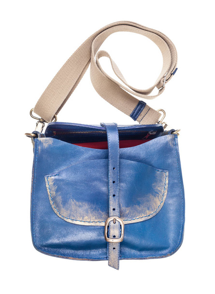 nyitott kék bőr táska textilpánt elszigetelt fehér háttér - Fotó, kép