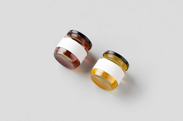 Modèles de pots de miel avec étiquette vierge. Deux couleurs différentes
. - Photo, image