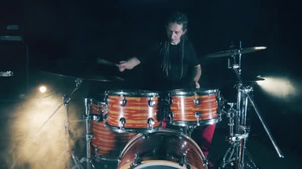 Music studio with a professional drummer while playing. Drum kit, drummer playing on drums. - Materiał filmowy, wideo