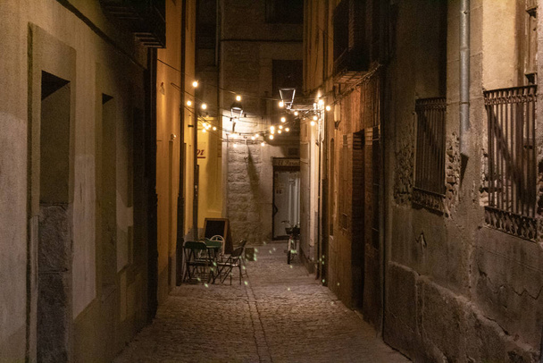 Charming backstreet iluminated whit lanterns at nights - Fotó, kép