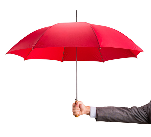 Main avec un parapluie rouge
 - Photo, image