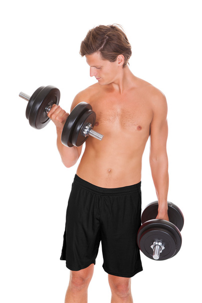 Man Exercising With Dumbbells - Foto, Imagen