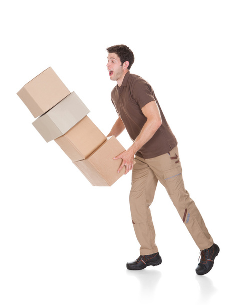 Delivery Man Dropping Boxes - Foto, Imagen