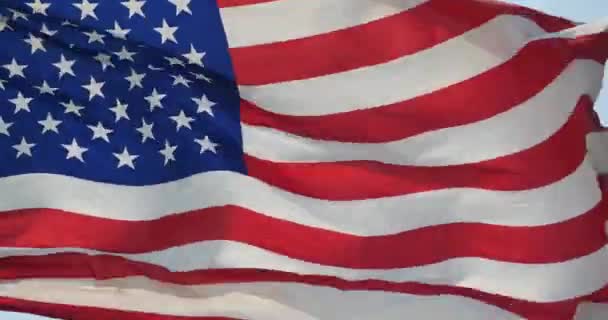 4k amerikanische Flagge flattert im Wind. - Filmmaterial, Video
