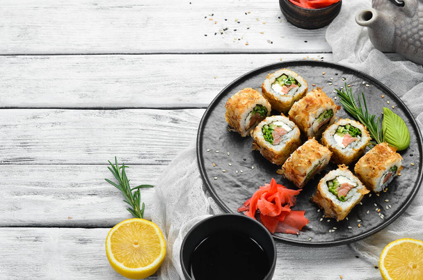 Sushi Bonito with salmon, cheese and tuna chips. Traditional Japanese sushi rolls - Valokuva, kuva