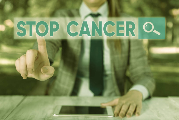 Segno di testo che mostra Stop Cancro. Foto concettuale prevenire la crescita incontrollata di cellule anormali nel corpo
. - Foto, immagini