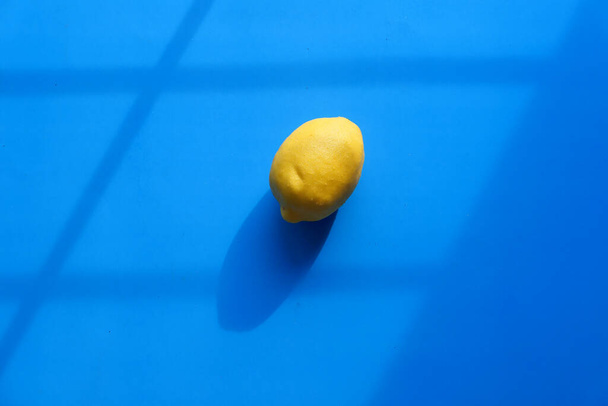 top view of lemon on color background  - Photo, Image