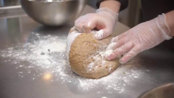 Chef making dough for bread baking on the restaurant kitchen - Felvétel, videó