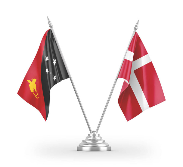 Banderas de mesa Dinamarca y Papúa Nueva Guinea aisladas sobre fondo blanco
  - Foto, Imagen