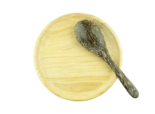 wood plate and spoon  isolated top view - Photo, Image