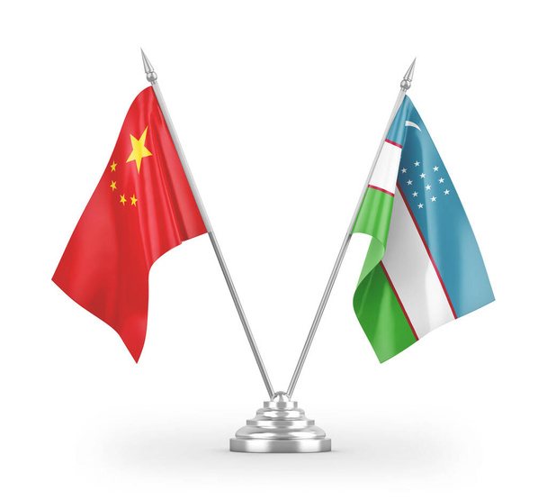 Узбекистан і Китай настільні прапори ізольовані на білому фоні 3d рендеринга - Фото, зображення