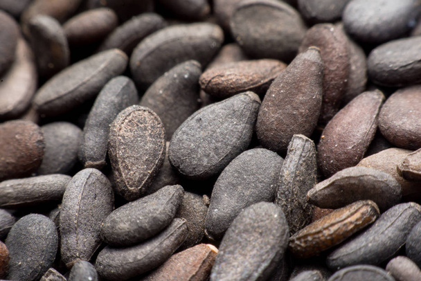 Close up Stapel van zwarte sesam zaden achtergrond  - Foto, afbeelding