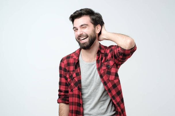 Happy casual hispanic man laughing on joke. Positive facial human emotion. - Photo, Image