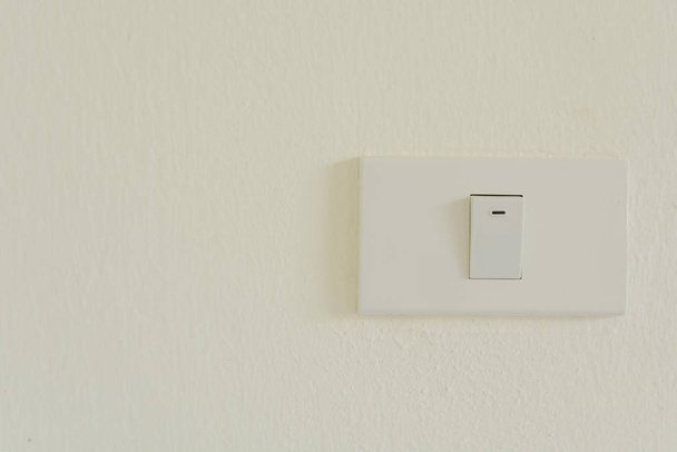 White light switch on wall turn on or turn off the lights, copy space - Photo, Image