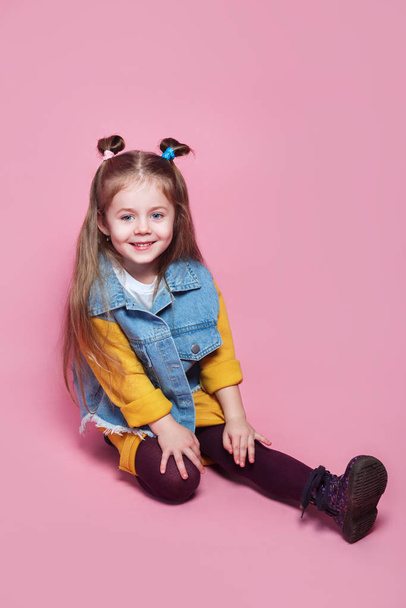 Cute and funny little girl in fashion clothes . Fashion children. - Zdjęcie, obraz