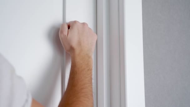 Knocking Door with Hand Close Up Banging on the Door - Felvétel, videó