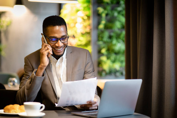 Portrait of black businessman making phone call - Photo, Image