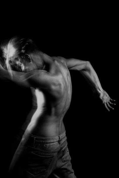 Artistic creative black and white series. Naked back spine curves. mysterious original conceptual  portrait of young naked man. Long exposure. Emotional creative artistic long exposure. Black white - Foto, Bild