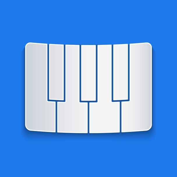 Paper cut Music synthesizer icon isolated on blue background. Electronic piano. Paper art style. Vector Illustration - Vector, Image