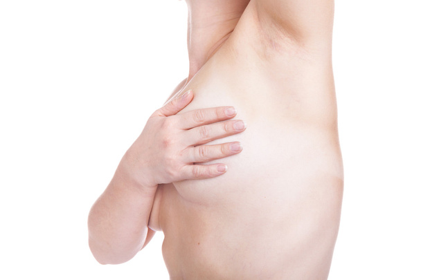 Woman examining breast, isolated on white - Photo, image