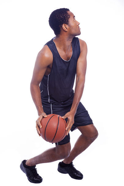 Basketball player ready to jump, isolated on a white background - Zdjęcie, obraz
