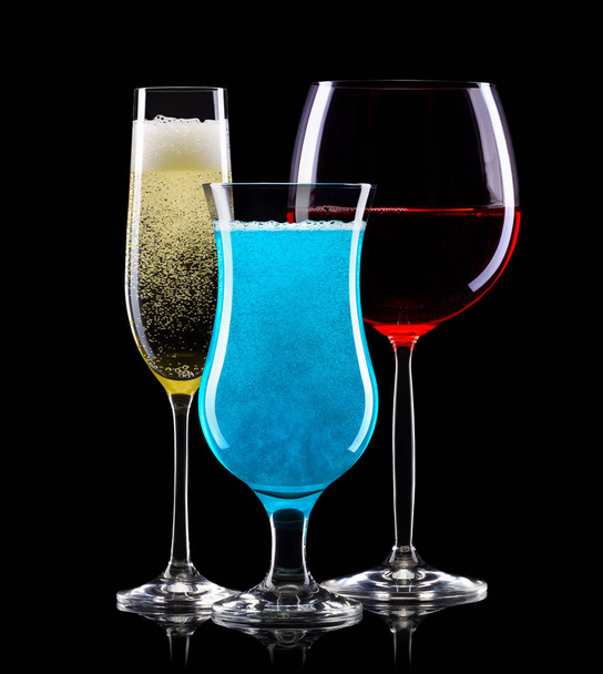 Set of different cocktail glasses for drinks on black background - Fotoğraf, Görsel