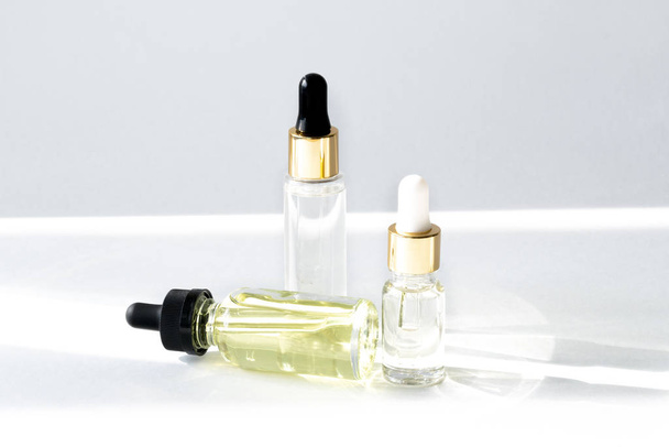 Anti aging serum with collagen and peptides in glass bottles with dropper  - Φωτογραφία, εικόνα