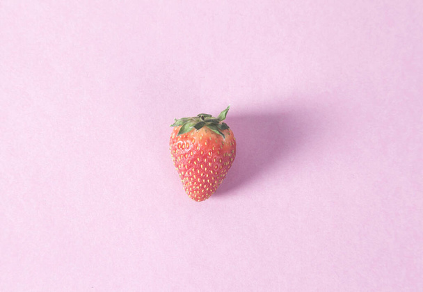strawberries on the pink desk background - Photo, image