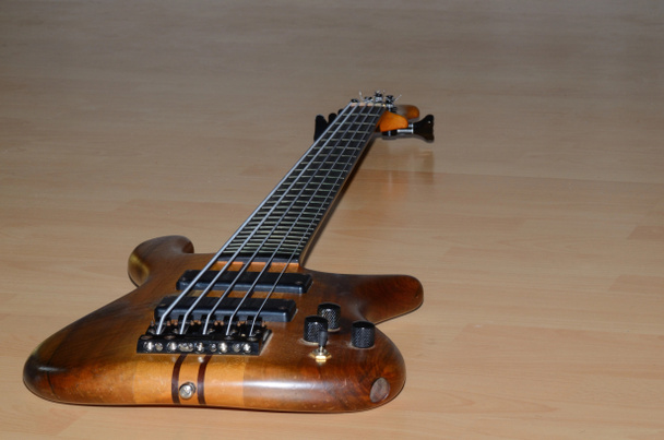 bass guitar on floor - Photo, Image