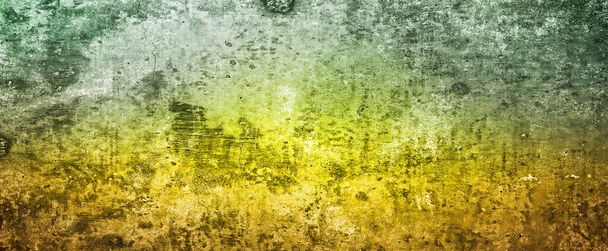 Αφηρημένο κίτρινο πράσινο φόντο με μαλακό φωτεινό χρυσό κέντρο λαμπερό με φωτεινά χρώματα και σκούρο μπλε πράσινο περίγραμμα με θολή στίγματα υφή - Φωτογραφία, εικόνα
