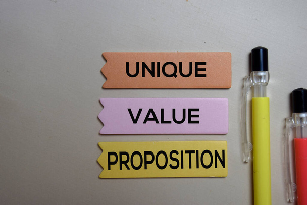 Unique Value Proposition - UVP text on sticky notes isolated on office desk - Photo, Image