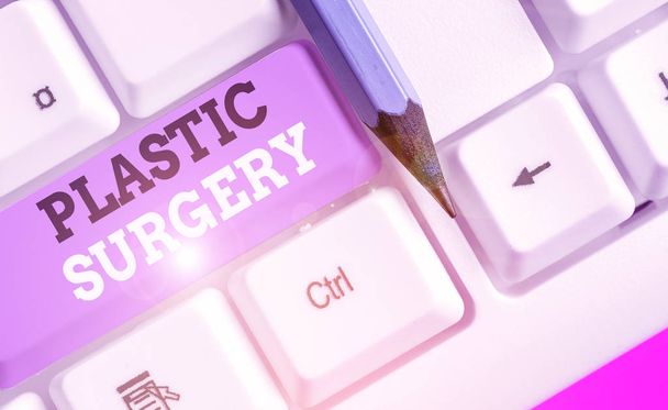 Writing note showing Plastic Surgery. Business photo showcasing repairing parts of the body by the transfer of tissue. - Photo, Image