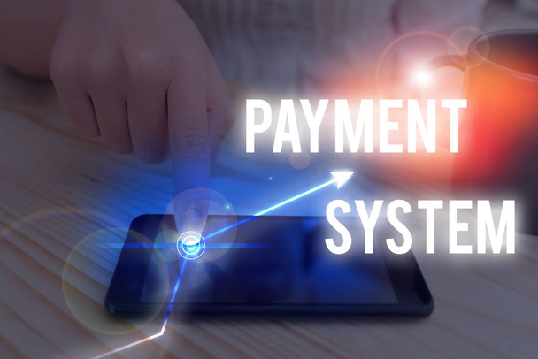 Text sign showing Payment System. Conceptual photo a system used to pay or settle financial transactions. - Photo, Image