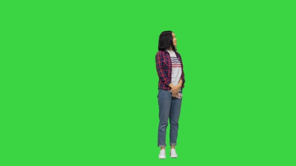 Girl waiting to her friends Happy multiracial young people friends meet on a Green Screen, Chroma Key. - Footage, Video