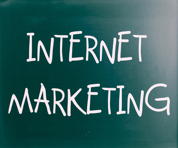 "Internet marketing" handwritten with white chalk on a blackboar - Photo, Image