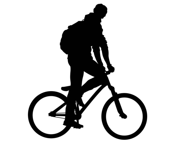 Young athlete on a bike for extreme stunts. Isolated silhouette on a white background - Vector, Imagen