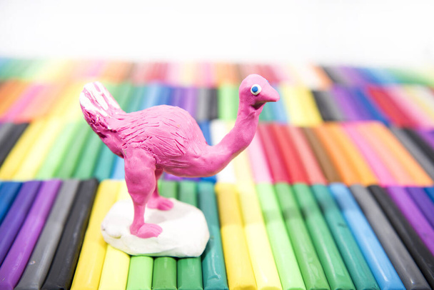 Play clay Animals. Ostrich on colored background. - Photo, Image