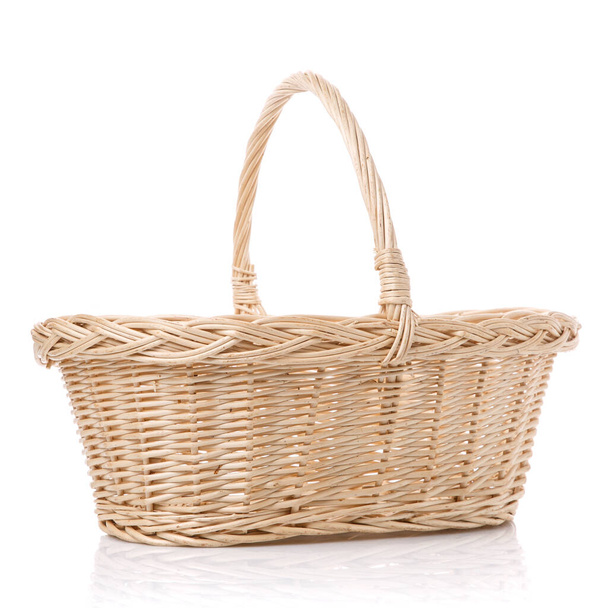 Rustic wicker basket for harvest isolated on white background. - Photo, Image