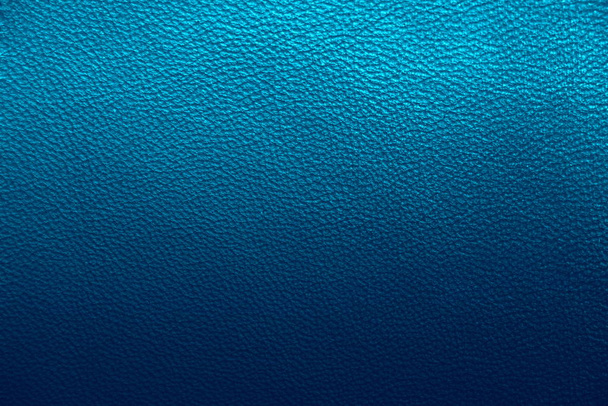 La texture du cuir véritable. Fond bleu
. - Photo, image