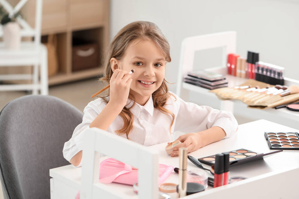 Cute little makeup artist at home - Photo, Image