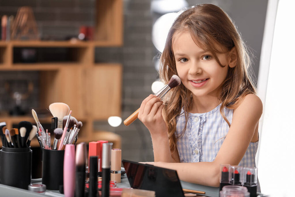 Cute little makeup artist at home - Фото, зображення