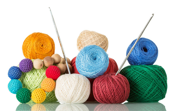 Original beads of knitted fabric, tangle of yarn and crochet hooks isolated on white background - Φωτογραφία, εικόνα