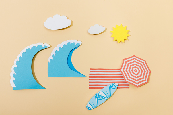 Top view of paper cut summer beach on beige background - Photo, Image
