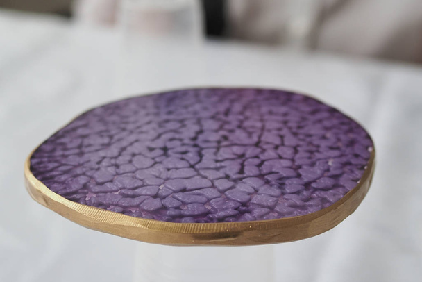 Epoxy resin coasters. purple gold. Epoxy resin art. - Photo, Image