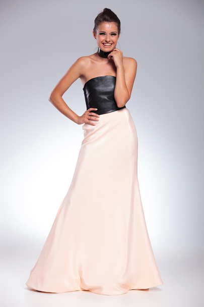 young laughing brunette woman in a long evening dress - Photo, Image