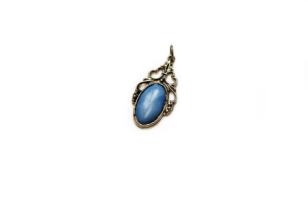 cute vintage medallion with blue gemstone, isolated on a white background - Foto, Imagem