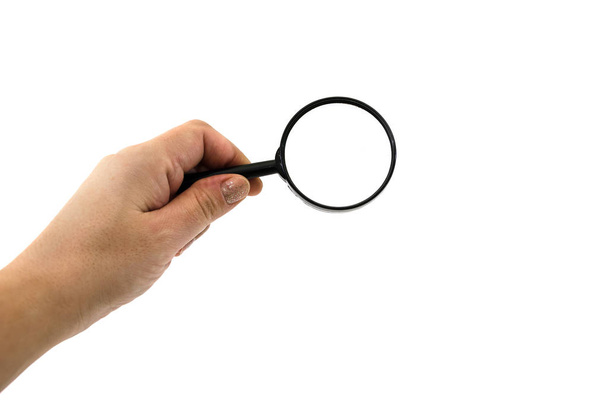 magnifier in hand isolated on a white background. Place for text. - Fotó, kép