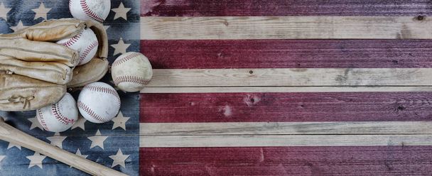 Old used baseballs, bat and glove on vintage United States wooden flag background. Baseball sports concept with copy space - Photo, Image